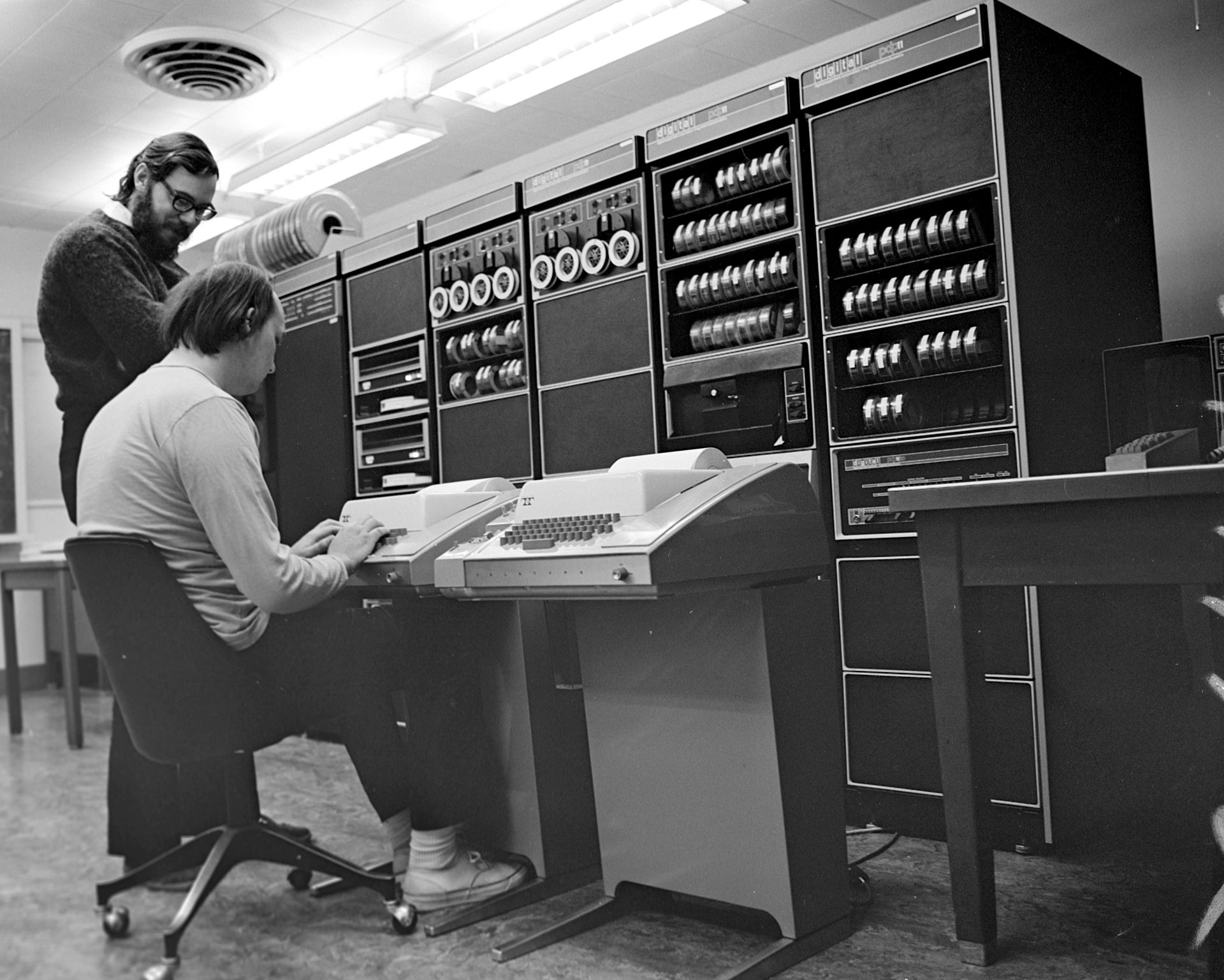 Ken Thompson and Dennis Ritchie, creators of UNIX. CC BY-SA 2.0 from http://en.wikipedia.org/wiki/Unix#/media/File:Ken_Thompson_(sitting)_and_Dennis_Ritchie_at_PDP-11_(2876612463).jpg
